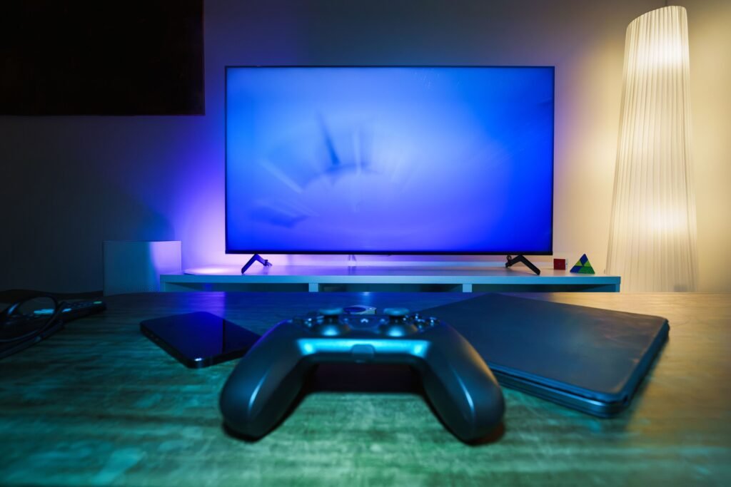 LED TV screen with ambient backlighting in modern home entertainment setup